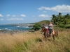 Ride your horse up for a mesmerizing panorama. / Pferd und Reiter bergauf um die Aussicht zu genießen.